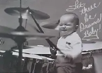 baby-on-drumset.webp