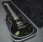 epiphone lp in case small.webp