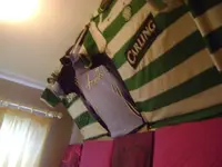 Pillows behind jerseys as bass traps.webp