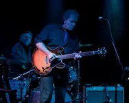 Tommy w guitar hilited.webp