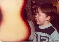 mike_2yrs_guitar.webp