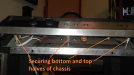 G) Bolts connecting top and bottom chassis.webp