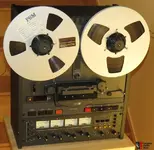 919922-a629608a-otari-mx5050-bqii-4-tracks-open-reel.webp